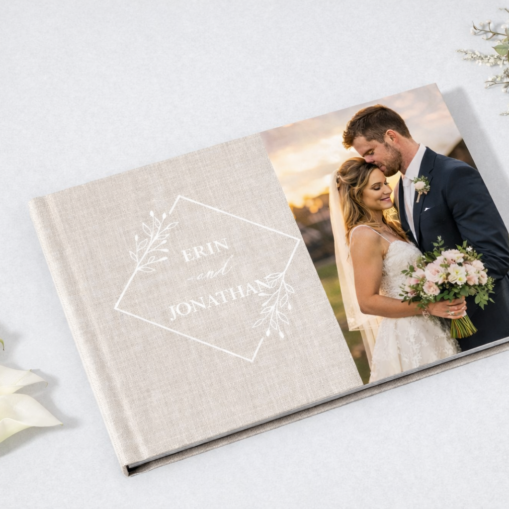 Wedding photo book by Iris Ramil featuring a couple outdoors, with floral accents and elegant text.